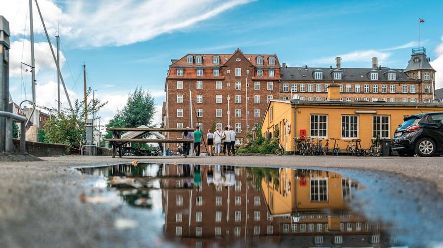 Copenhagen: 1.5-hour Private Walking Tour of Christianshavn - Crossing from Nyhavn: Colorful Houses, Inderhavnsbroen, and Canal Time