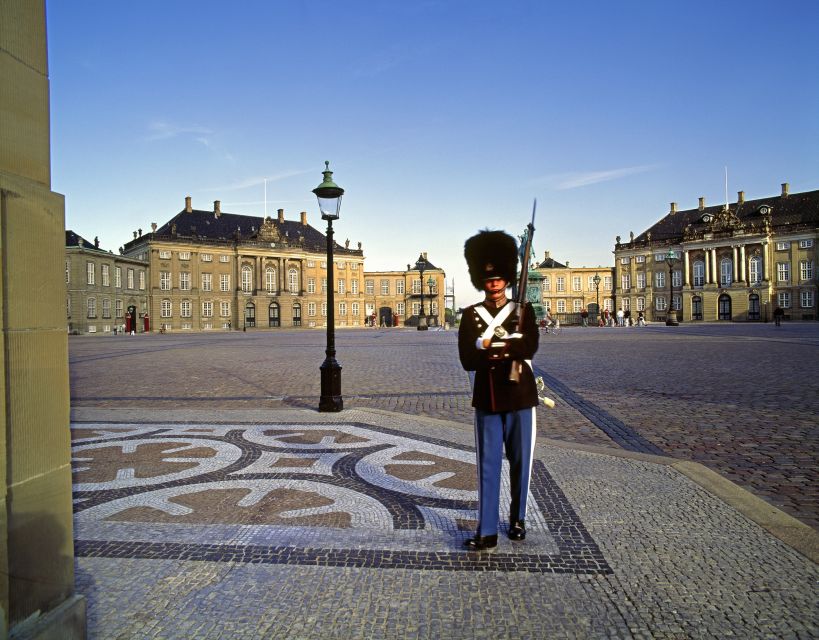 Copenhagen: City Highlights Guided Bike Tour - The city-bike experience: modern bikes, optional helmet, and luggage help