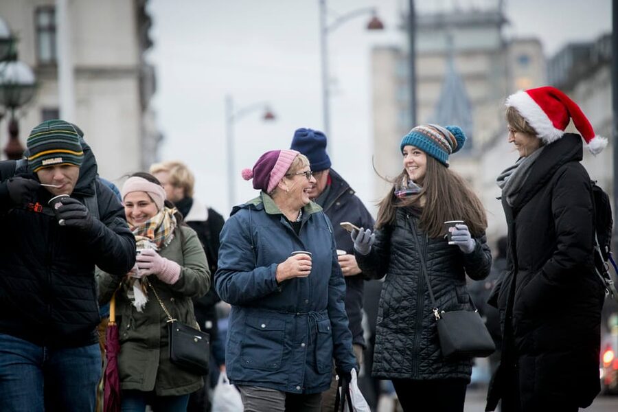 Copenhagen: Evening Gourmet Walk with Food & Drinks Tasting - The first stops in the market: cheeses, mini smørrebrød, barley-risotto, and chocolate