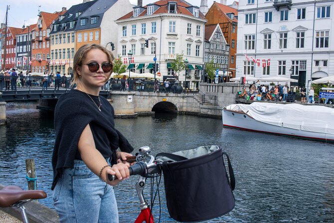 Copenhagen Highlights 3 Hour Bike Tour with local Guide - Nyhavn harbor scenery: the romantic stop with real breathing room
