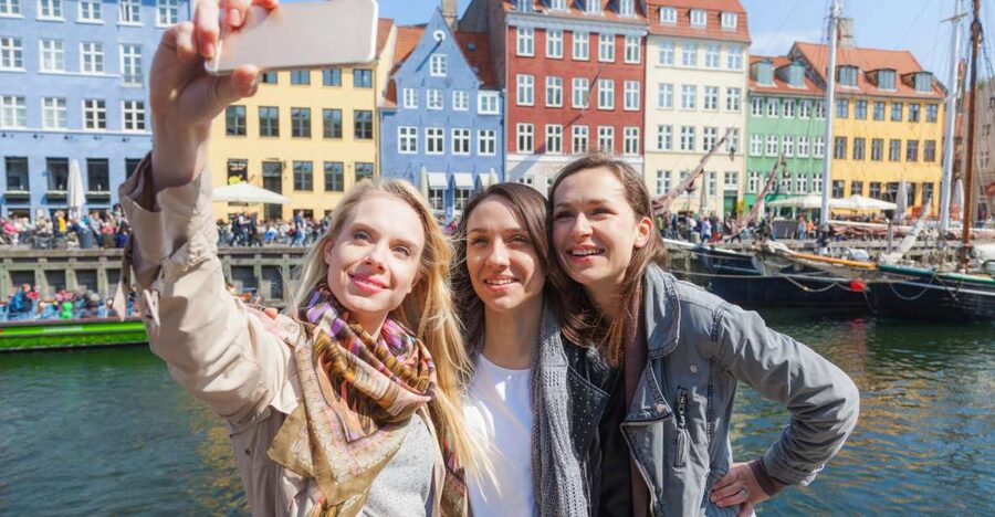 Copenhagen: Highlights & Secrets Private Walking Tour - Nyhavn and Pistolstræde, colorful port energy plus narrow-street texture