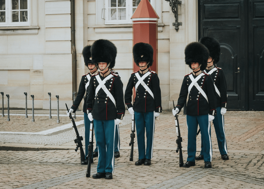 Copenhagen: Hygge & Highlights Walking Tour with Local Guide - Amalienborg Palace square: royal power without the stuffiness