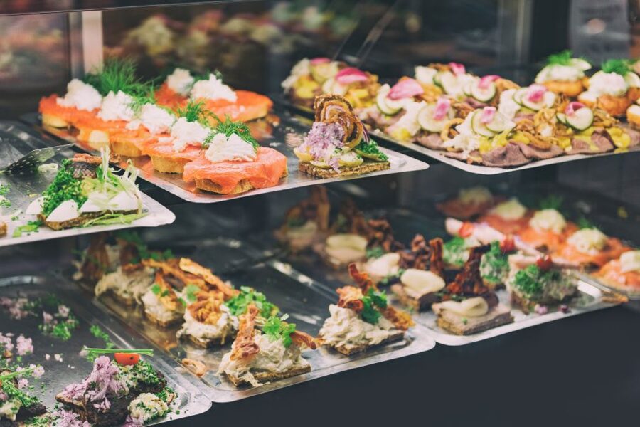 Copenhagen: Scandinavian Delights Food & Drink Private Tour - Torvehallerne market: fish cakes and beer in a real food hub