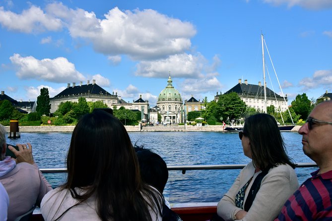 Copenhagen Sightseeing Classic Canal Tour With Live Guide - Christianshavn canal cruise: cobbles, pastel houses, and defense planning