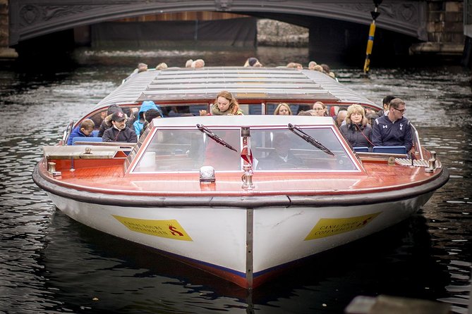 Copenhagen Sightseeing Classic Canal Tour With Live Guide - Our Saviour’s church spire and the Opera House by the harbor