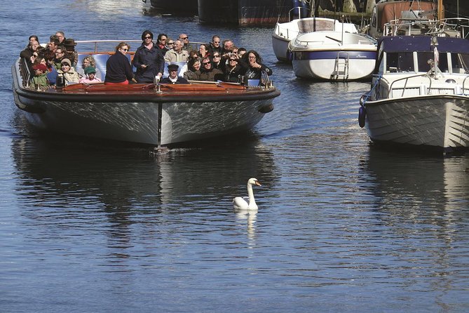 Copenhagen Sightseeing Classic Canal Tour With Live Guide - Amalienborg Palace from the water: royals, canals, and the 1700s detail