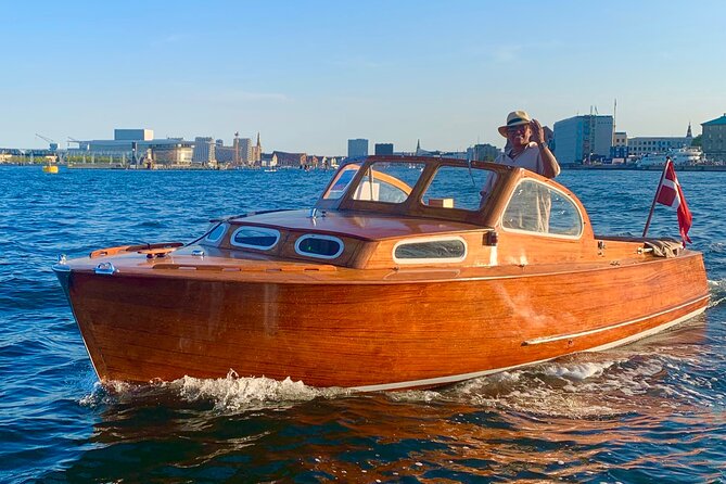 Private Copenhagen Boat cruise in Scandinavian mahogany boat - Where you start: Gammel Strand and a one-hour orientation