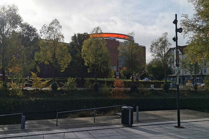 The Ancient Viking Stronghold of Aros: A Self-Guided Audio Tour in Aarhus - Den Gamle By and the period-costume atmosphere near the end