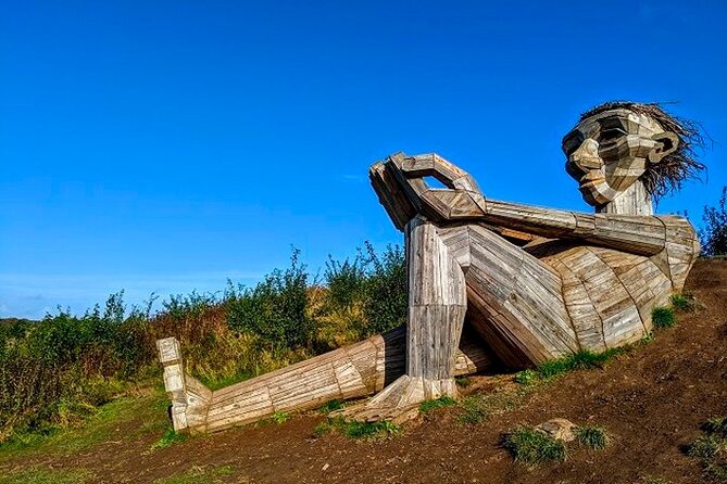The Six Forgotten Giants Trolls Hunt with Minibus - scar under the bridge in Ishøj: Scrapwood Art and a Chilean Name